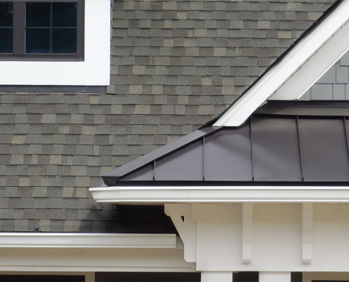 Black shingle and metal roofing