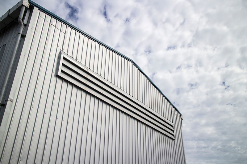 metal siding building with vent