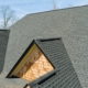 A comparison of different roofing options, including a second layer and full roof replacement.