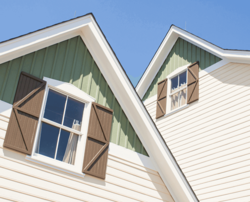 A comparison of different siding materials, including James Hardie siding.