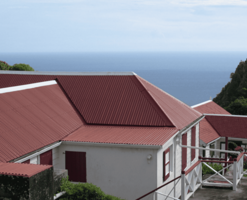 Comparing tin roofing to other metal roofs and their costs.