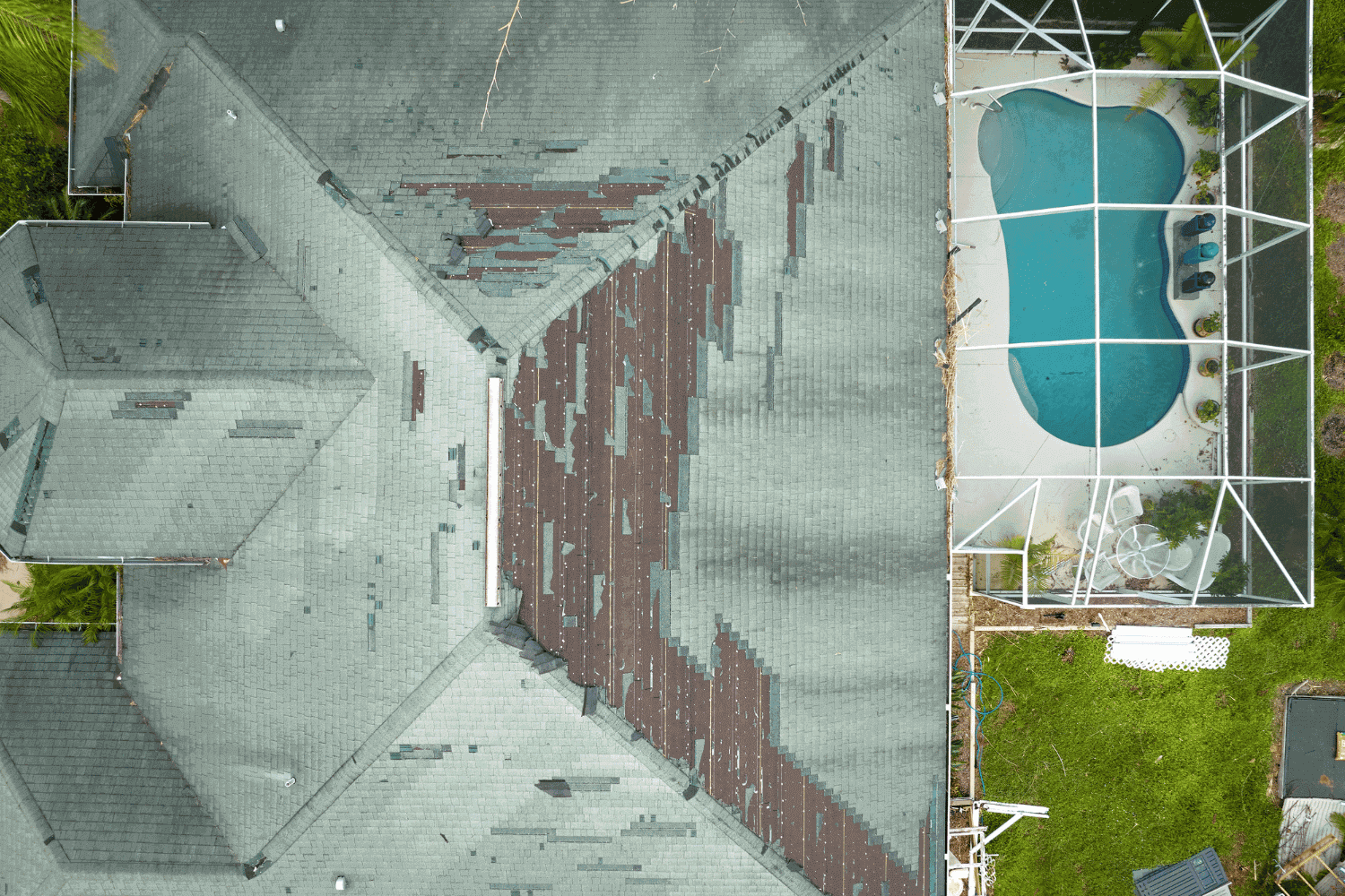 A visual representation of the consequences of ignoring missing shingles, showing a damaged roof.