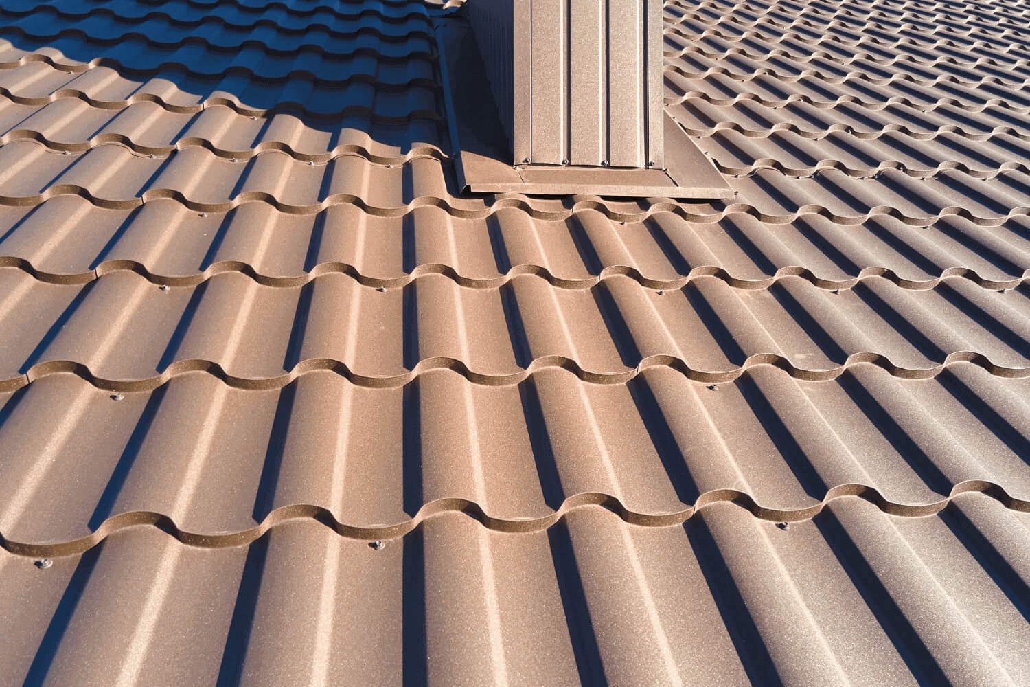 An image of a well-maintained roof with new shingles, illustrating preventive measures.