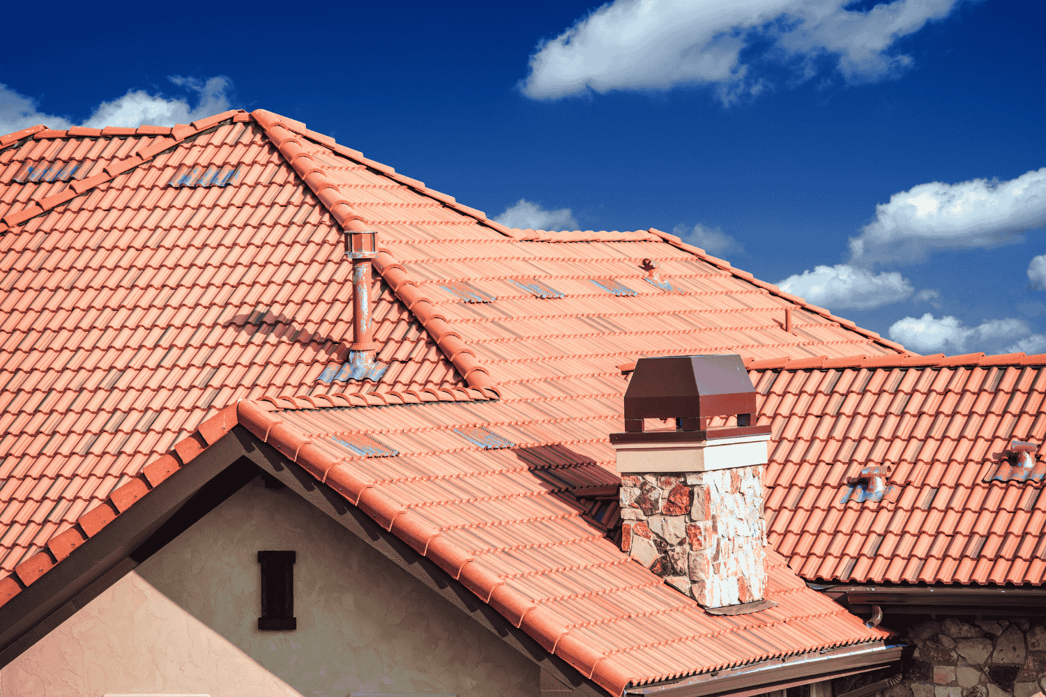 A home with matching roof shingle and siding colors. A home with matching roof shingle and siding colors.