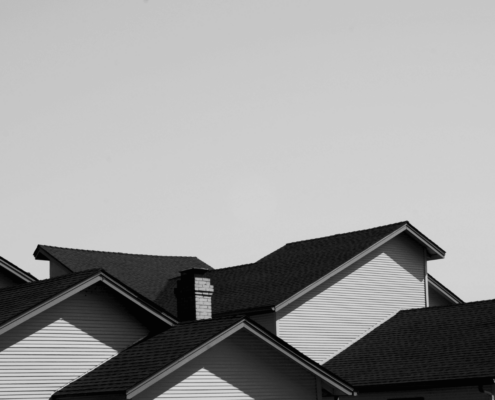 An illustration showing different types of roof insurance coverage options.