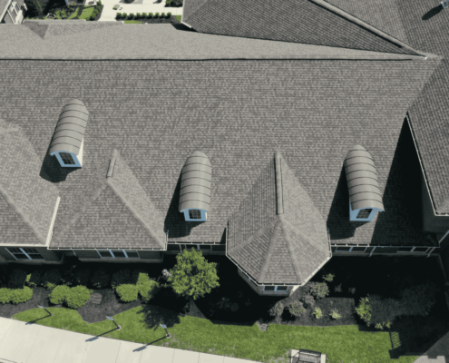 Comparing architectural shingles to other roofing materials.