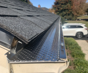roof-of-a-house-showing-gutter-and-gutter-guard-pr-2023-11-27-05-23-31-utc-scaled roof of a house showing gutter and gutter guard
